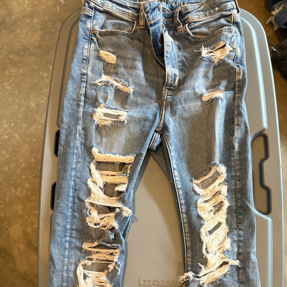 Distressed Women's Light Blue Ripped Jeans - Picture 1 of 4